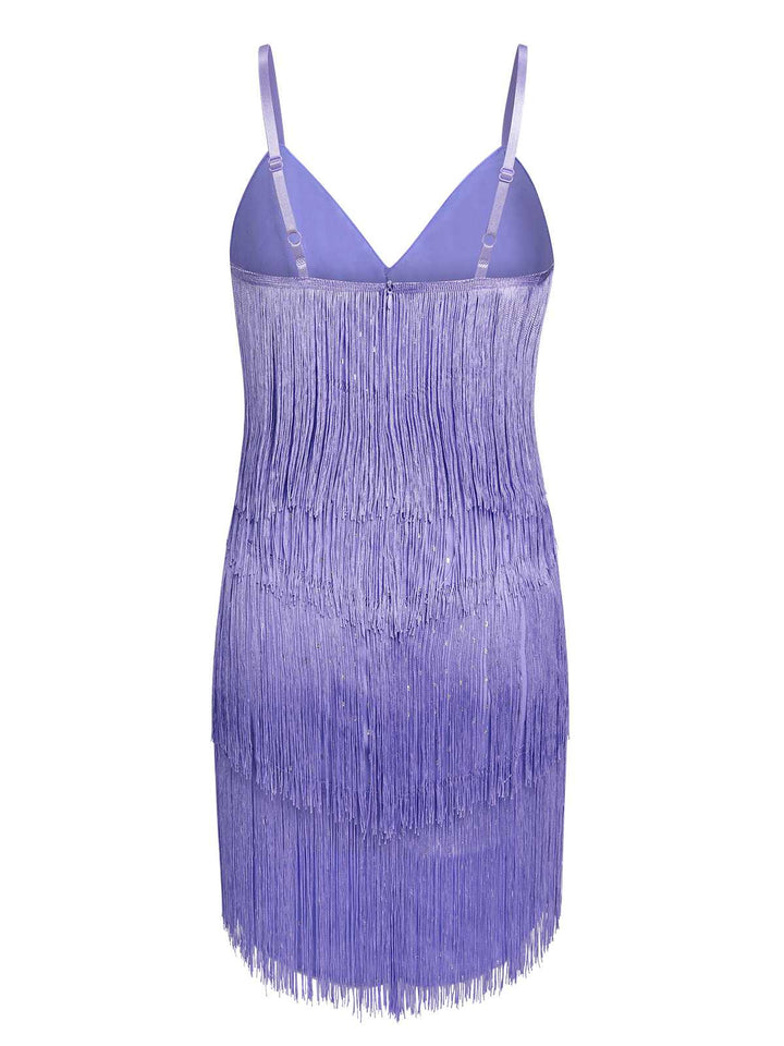 This Purple 1960s Spaghetti Strap Fringe Dress wraps her in 1960s elegance, one twirl at a time