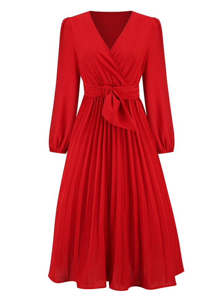 She slips into this Red 1940s V-Neck Solid Pleated Dress and suddenly it&