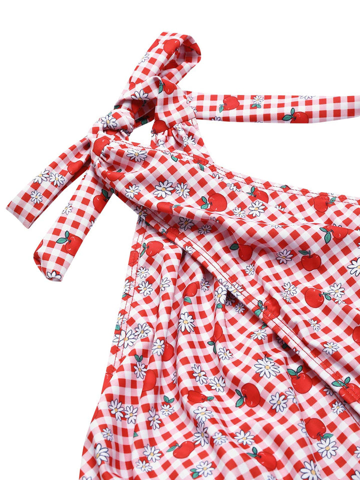 This Red Apple Plaid Wrapped Swimsuit carries vacation dreams in every stitch