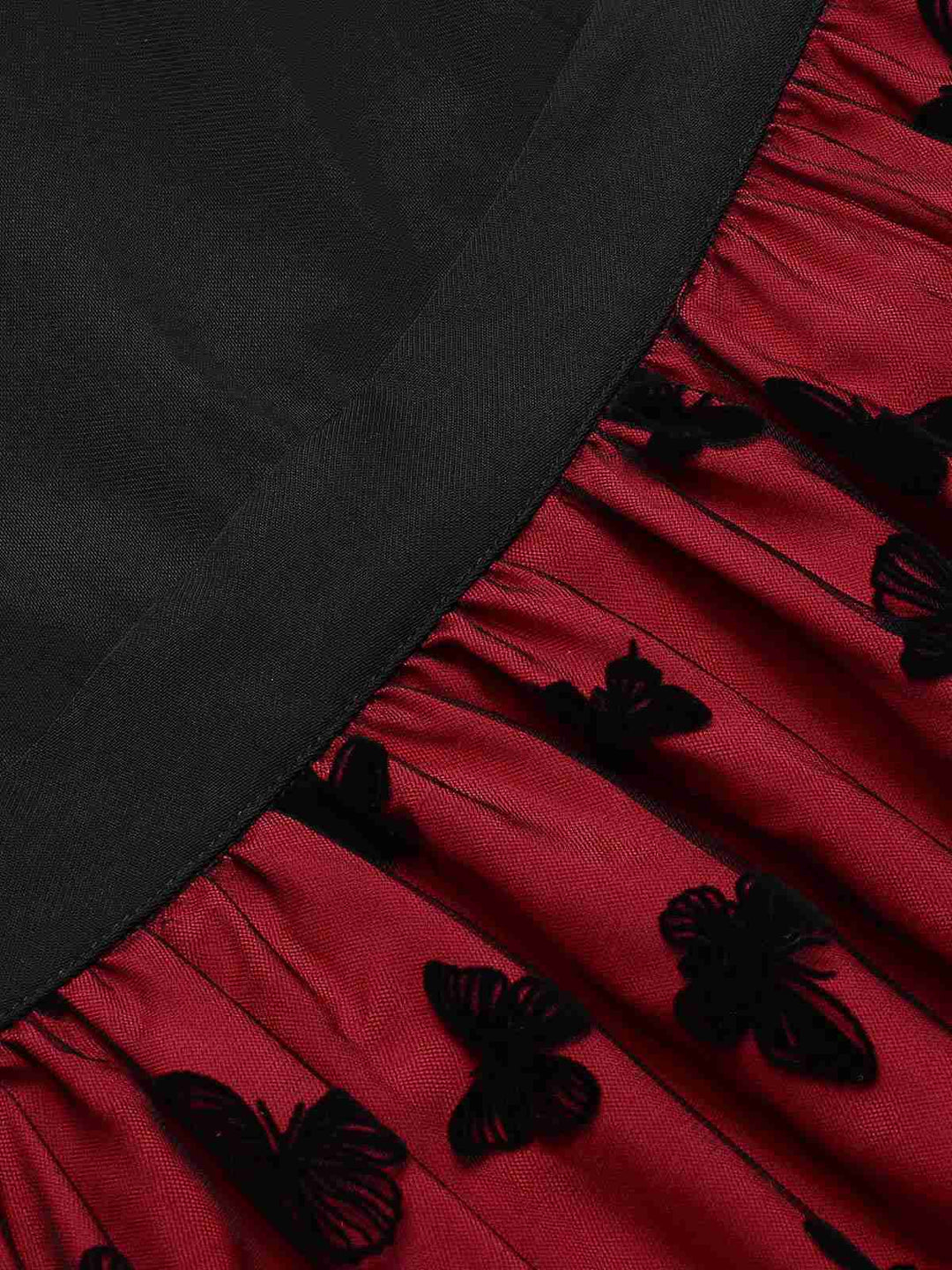She slips into this Red 1950s Butterfly Embroidered Mesh Patchwork Dress and suddenly it&