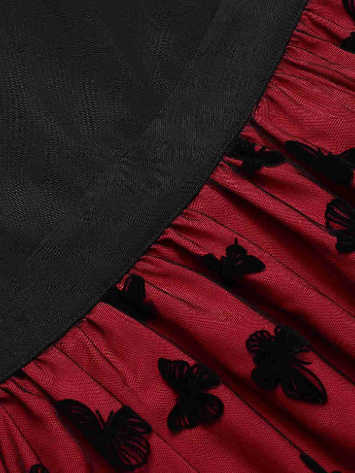 She slips into this Red 1950s Butterfly Embroidered Mesh Patchwork Dress and suddenly it&