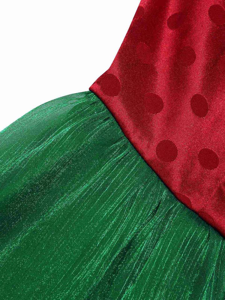 She slips into this Red 1950s Christmas Polka Dot Mesh Dress and suddenly it&