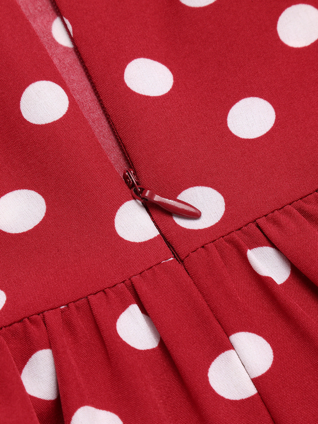 She slips into this Red 1950s Polka Dot Halter Dress and suddenly it&