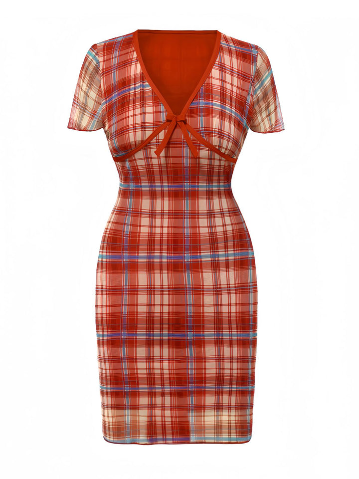 She slips into this Red 1960s V-Neck Bow Plaid Pencil Dress and suddenly it&