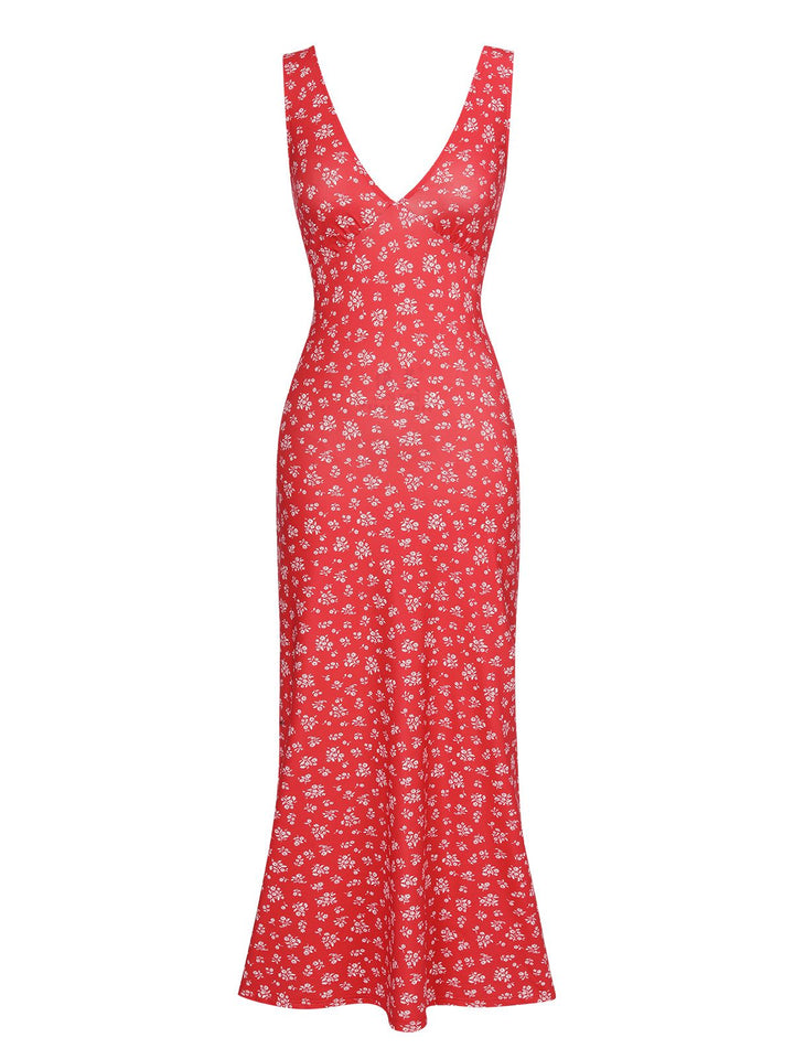 She slips into this Red 1960s V-Neck Ditsy Floral Dress and suddenly it&