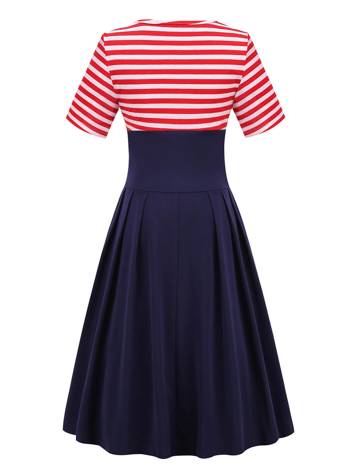 This Red &amp; Blue 1970s Stripe Patchwork Swing Dress wraps her in 1970s elegance, one twirl at a time