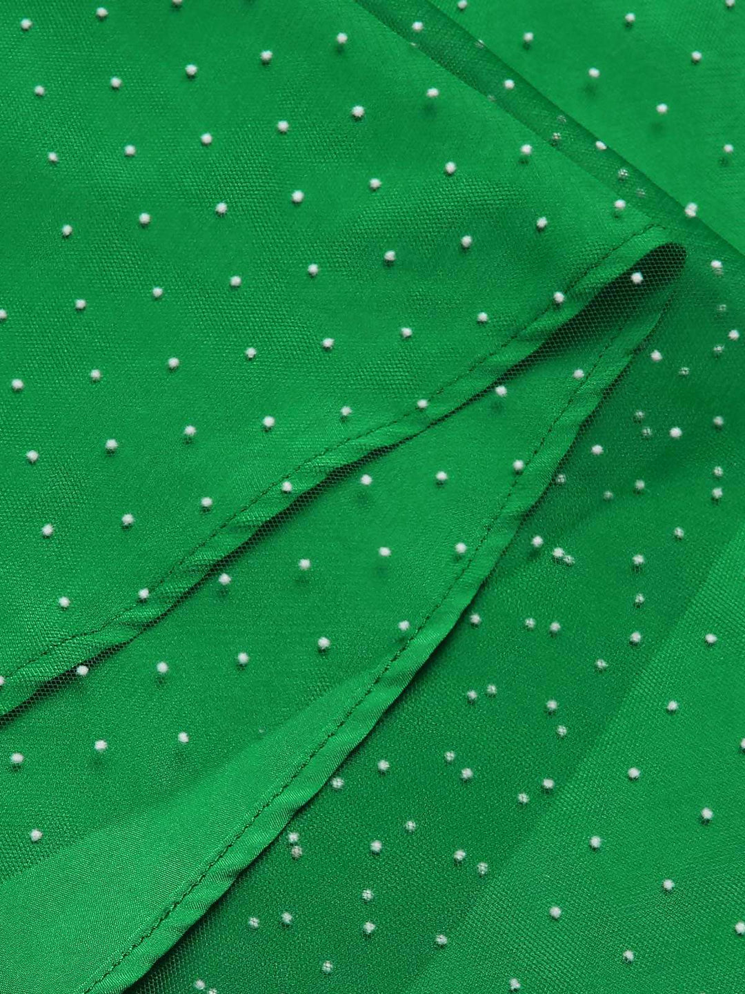 This Red &amp; Green 1950s Christmas Polka Dots Dress wraps her in 1950s elegance, one twirl at a time