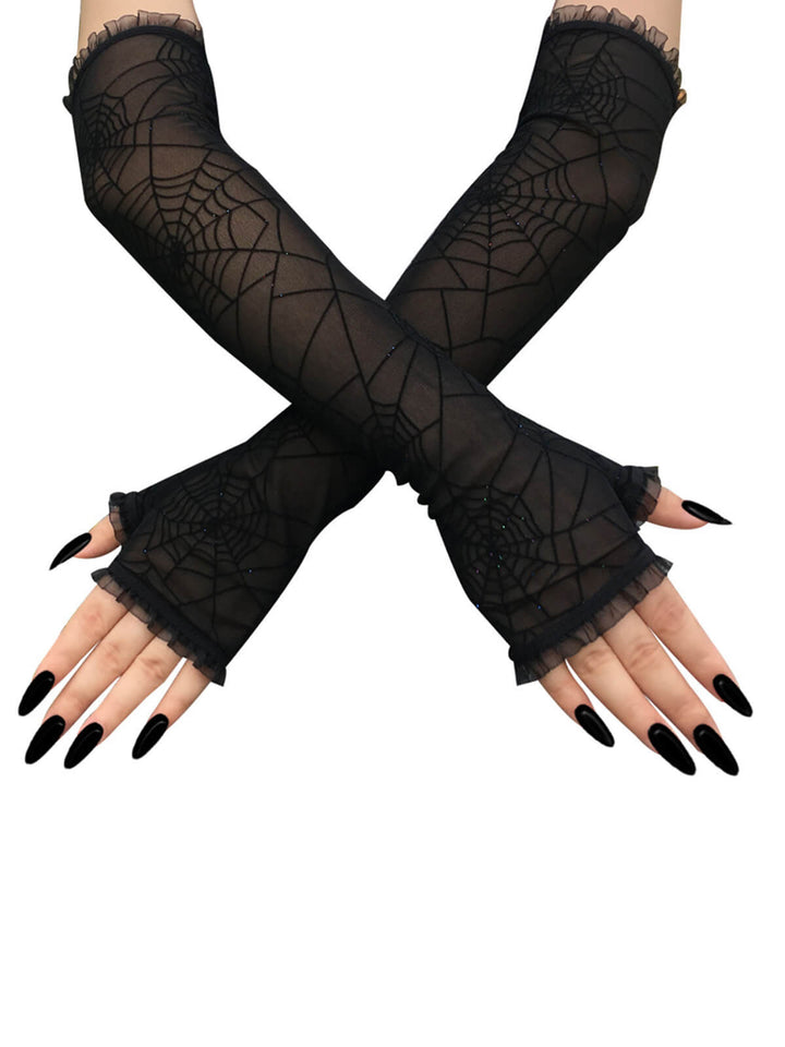 She adds this Retro Spider Web Fingerless Gloves and suddenly it&
