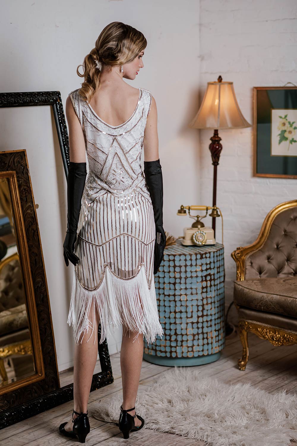 White 1920s Fringed Flapper Dress — a 1920s silhouette that turns sidewalks into runways