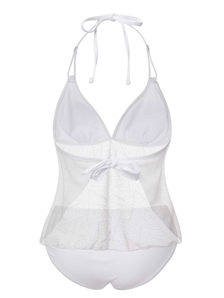 This White 1930s Halter Backless Solid Swimsuit carries 1930s vacation dreams in every stitch