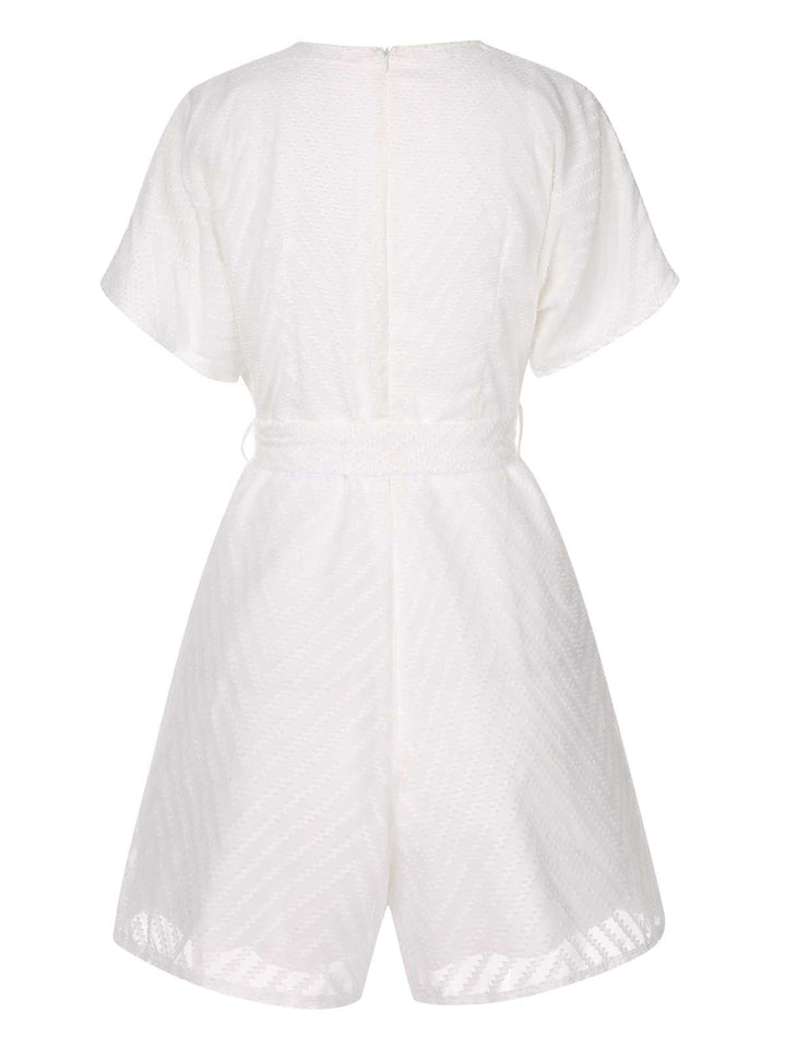 White 1950s Deep V-Neck Textured Belted Romper: 1950s detail work for the woman who notices