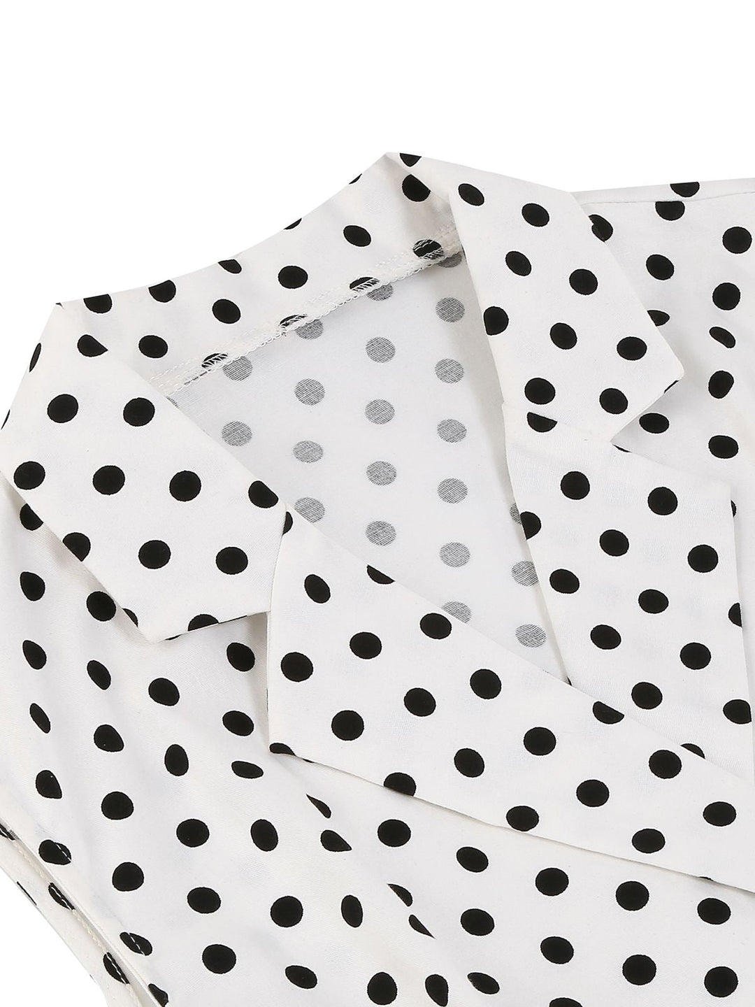 White 1950s Polka Dot Lapel Swing Dress — vintage elegance for the modern woman