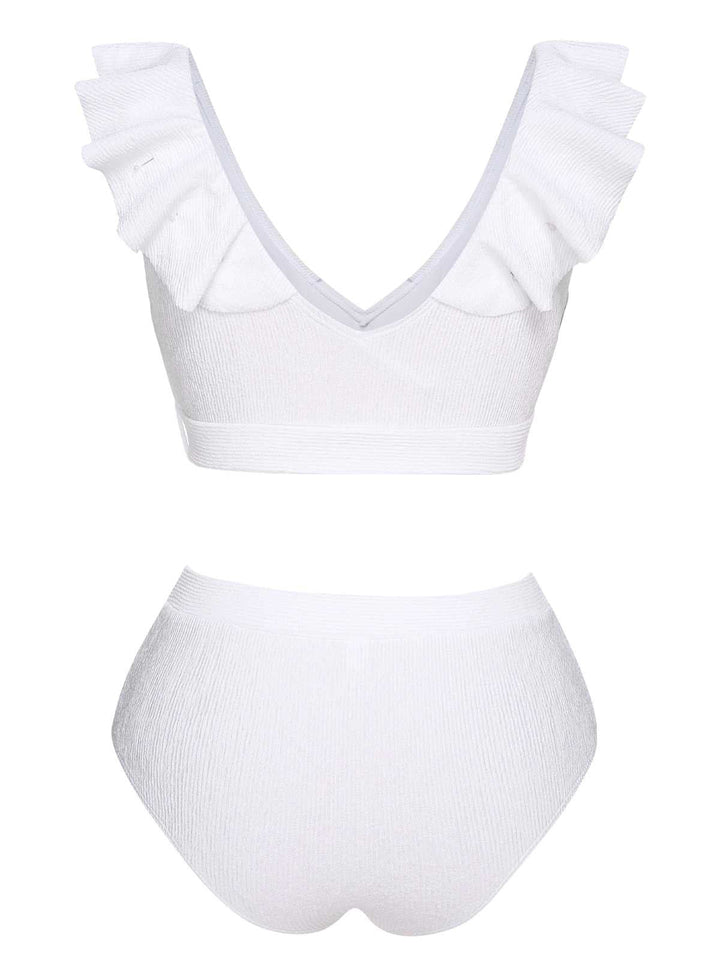 This White 1950s Ruffles Solid Swimsuit carries 1950s vacation dreams in every stitch