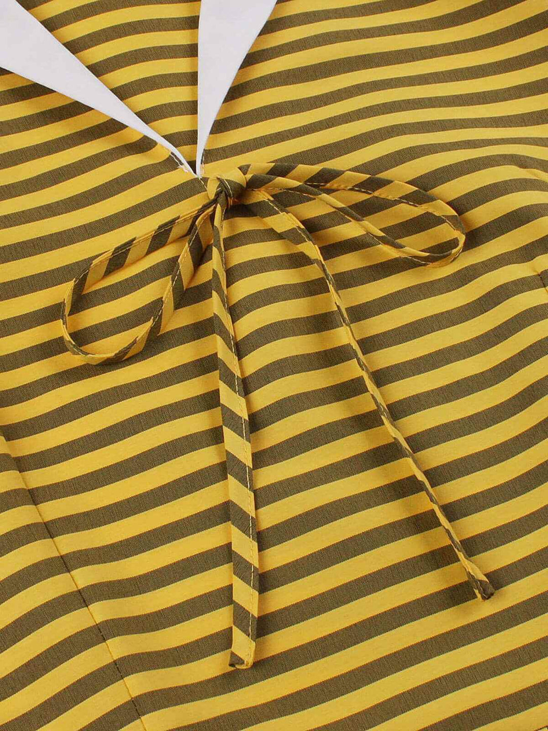 She slips into this Yellow 1950s Bow Striped Swing Dress and suddenly it&