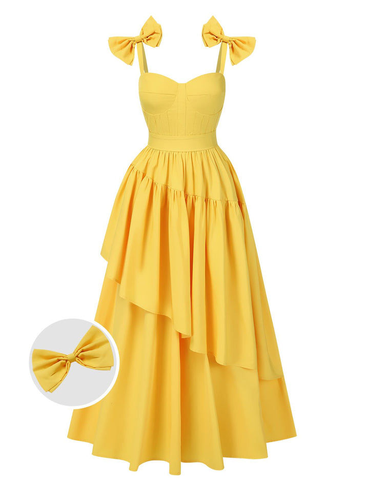 She slips into this Yellow 1950s Heart Neck Bow-Strap Tiered Dress and suddenly it&