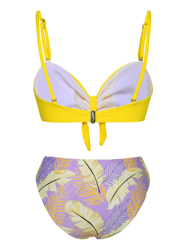 This Yellow 1960s Plant Prints Halter Bow Swimsuit carries 1960s vacation dreams in every stitch