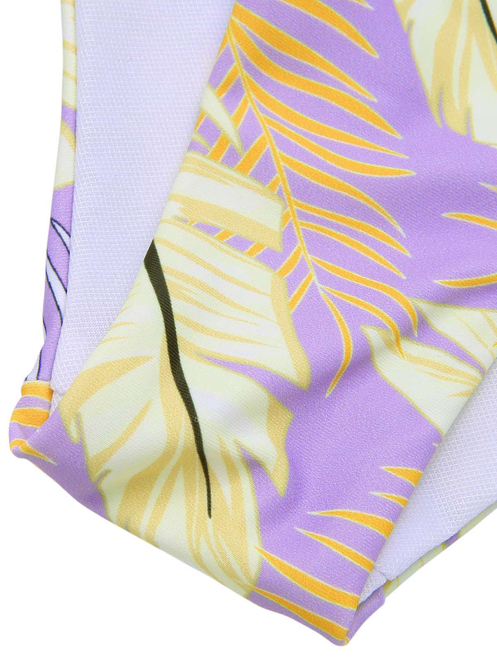 Yellow 1960s Plant Prints Halter Bow Swimsuit — because 1960s glamour never goes out of style